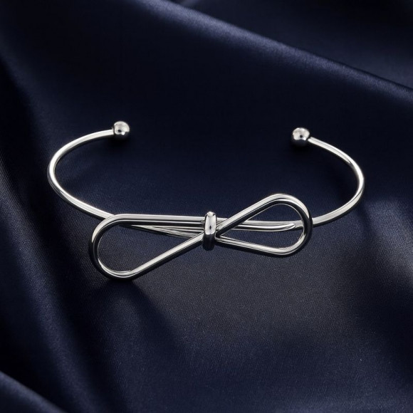 Браслет-кафф с декоративным узлом и сферическими наконежниками 1J12458CJJ Браслет-кафф с декоративным узлом и сферическими наконежниками 1J12458CJJ