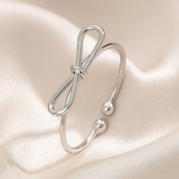 Тонкое серебристое кольцо в форме изящного бантика 1J12460CJJ