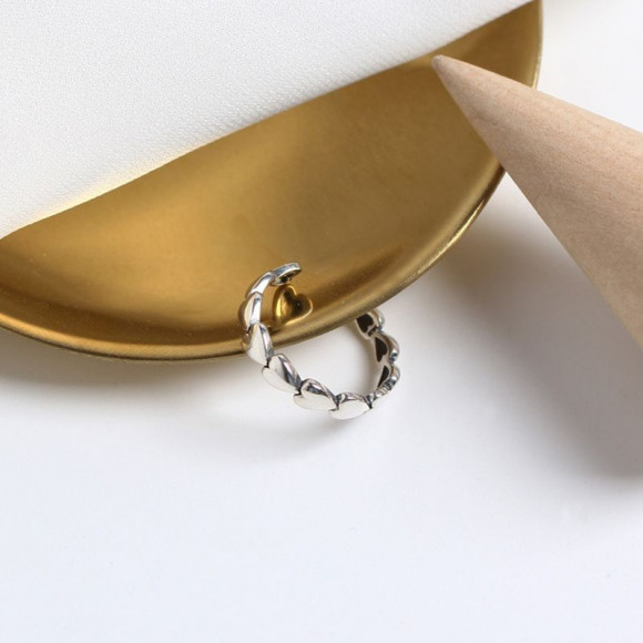 Разомкнутое кольцо из миниатюрных стальных сердец 1J12275CJJ