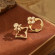 Серьги-гвоздики асимметричные фигуры с цветами 1J11996CJJ