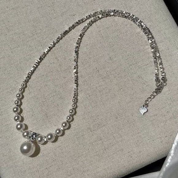 Элегантные жемчужные бусы с нарастающим диаметром 1J11646CJJ