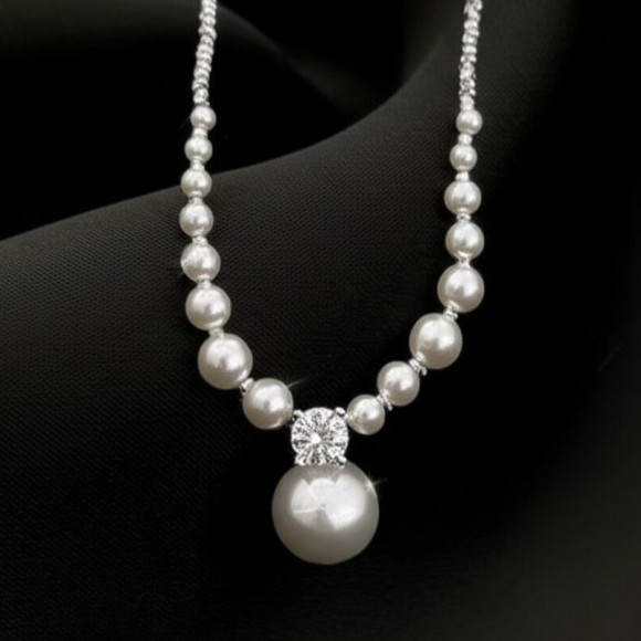 Элегантные жемчужные бусы с нарастающим диаметром 1J11646CJJ