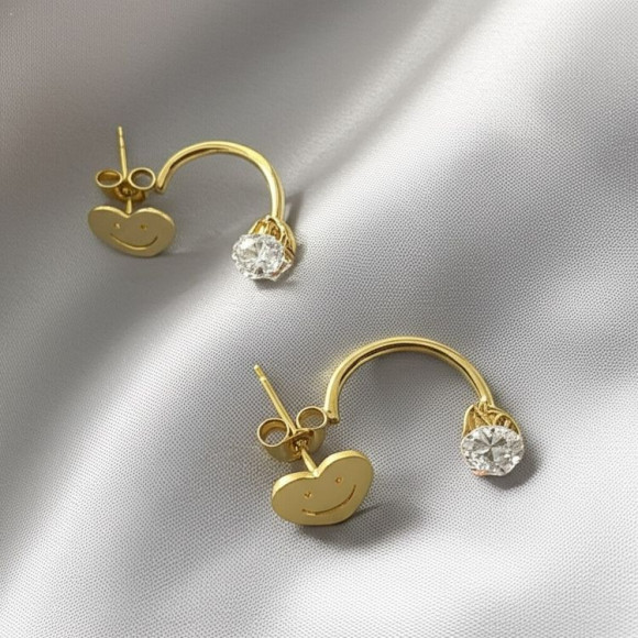 Золотистые стальные серьги-джекеты в форме сердец со смайлами и кристаллами 1J11517CJJ Золотистые стальные серьги-джекеты в форме сердец со смайлами и кристаллами 1J11517CJJ