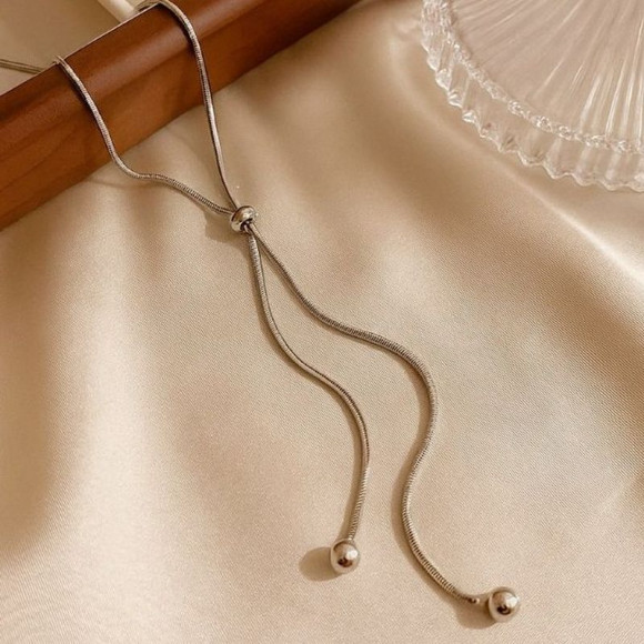 Титановое колье-галстук с шариками-бегунками 1J12228CJJ