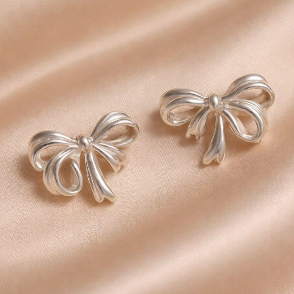 Серьги-гвоздики бантики медь напыление платиной 1J12405CJJ